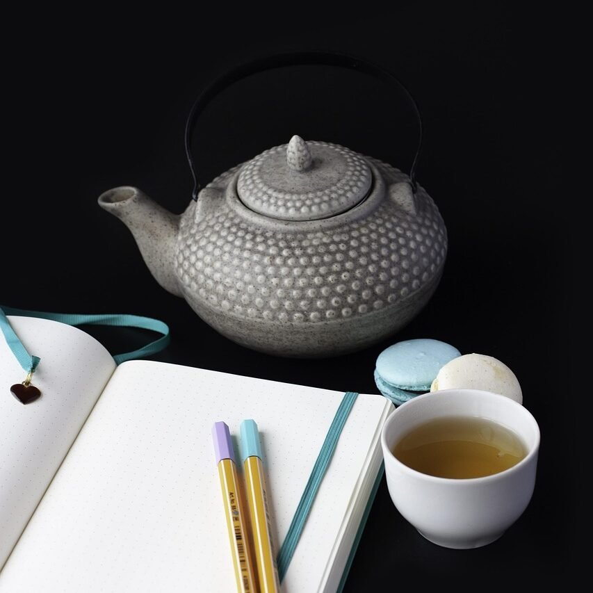 About kettle, green tea, notebook, drink, diary, pen, kettle, diary, diary, diary, diary, diary